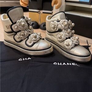 CHANEL Metallic Gold Sneakers with Floral Details